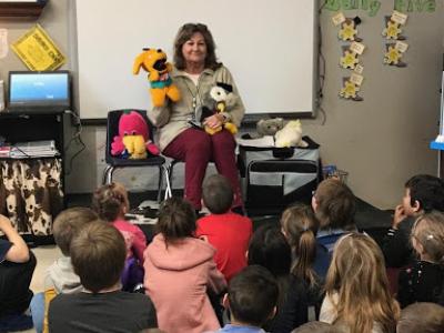image of Angela  Kelley teaching children in classroom