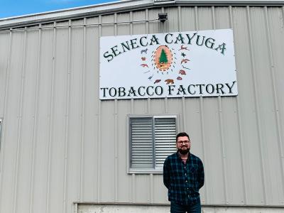Mark Morrison standing in front of SCN tobacco factory