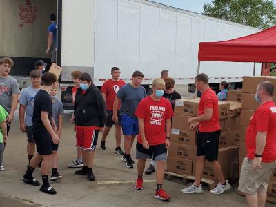 SCN volunteers handing out food
