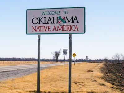 View over the road near the Oklahoma State line and Welcome sign