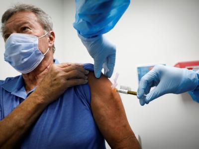 Image of someone getting the Vaccine 